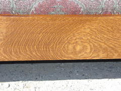 Detail hand-selected quarter-sawn white oak grain in front seat rail.